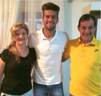Magali Lino De Souza Becker with her son Alisson Becker and husband Jose Agostinho Becker